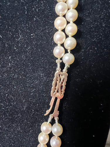 Collier Collier double rang Akoya en or jaune, grenats et diamants 58 Facettes 933
