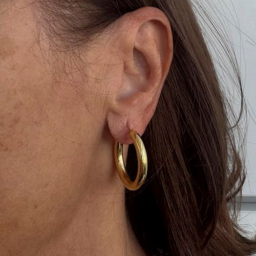 Boucles d'oreilles Unoaerre - Boucles d'oreilles créoles en or jaune 58 Facettes 38892