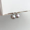 Boucles d'oreilles Underwater - Boucles d'oreilles en or blanc, perles Akoya grises et diamants 58 Facettes GER1326WG