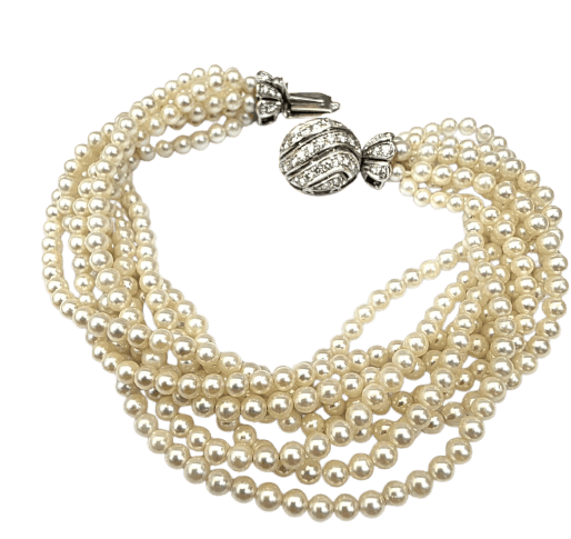 Bracelet torchon multifils en perles blanches, or blanc et diamants