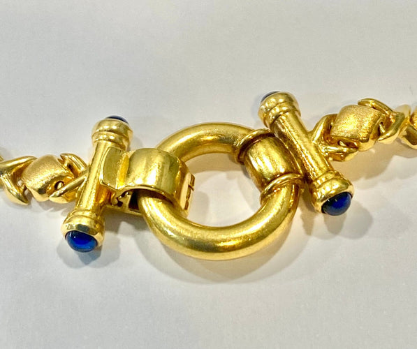 Bracelet Bracelet maille croisillons en or jaune et saphirs 58 Facettes 21169