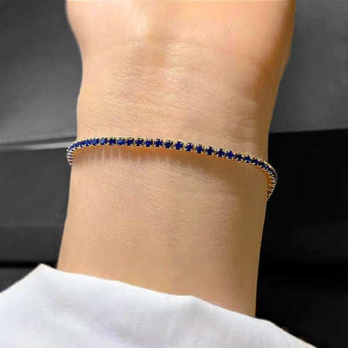 Bracelet Bracelet tennis en or 18 carats et saphirs bleus 58 Facettes GBT1280YG