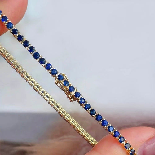 Bracelet Bracelet tennis en or 18 carats et saphirs bleus 58 Facettes GBT1280YG