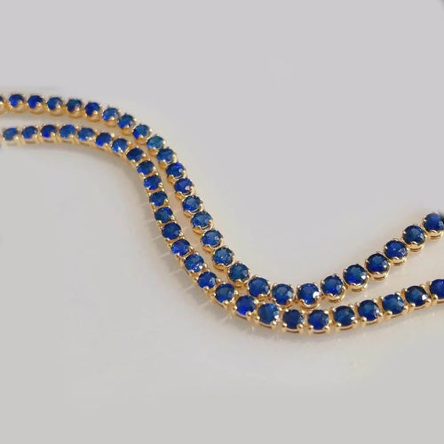 Bracelet Bracelet tennis en or 18 carats et saphirs bleus 58 Facettes GBT1280YG