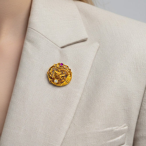 Broche André Kauffer - Broche chimère en or 18k, rubis et diamant 58 Facettes BRO-1009
