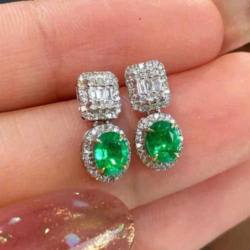 Boucles d'oreilles en or blanc avec émeraudes et diamants 58 Facettes GER1014GN