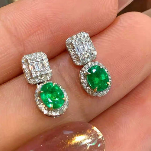Boucles d'oreilles en or blanc avec émeraudes et diamants 58 Facettes GER1014GN