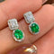 Boucles d'oreilles en or blanc avec émeraudes et diamants 58 Facettes GER1014GN