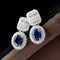 Aitches One of A Kind - Boucles d'oreilles en or blanc saphirs et diamants 58 Facettes GER1014BL