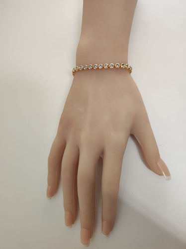 Bracelet rivière en or jaune 18K et diamants 58 Facettes LP1928/MMNNB