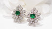 Boucles d'oreilles Boucles d’oreilles en or blanc 18 kt, diamants et émeraudes 58 Facettes 30089