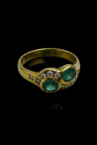 Bague 55 Bague sinuose en or jaune 18 carats avec émeraudes et diamants 58 Facettes