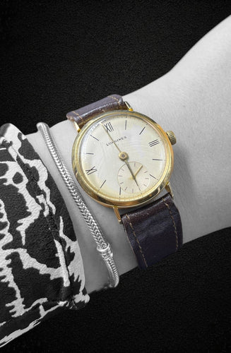 Montre Longines - Montre vintage en or jaune 58 Facettes