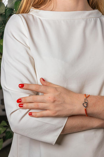 Dinh Van Double Cœurs - Bracelet cordon en or blanc 58 Facettes 5577274CN