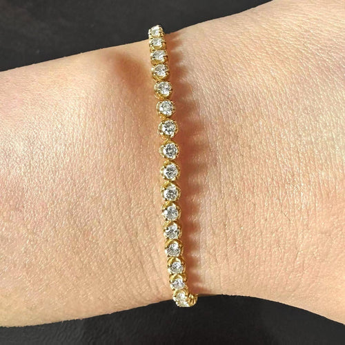 Disco - Bracelet tennis en or 18K et diamants 2,0 ct 58 Facettes GBT1331YG