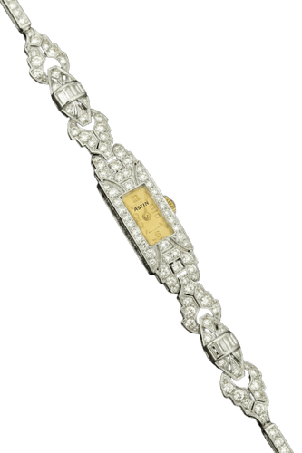 Montre Astin - Montre bracelet Art déco en or blanc 18 carats et diamants 58 Facettes