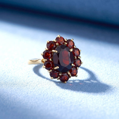 Bague 55 Bague marguerite en or jaune 18K et grenats 58 Facettes 1789