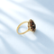 55 Bague marguerite en or jaune 18K et grenats 58 Facettes 1789