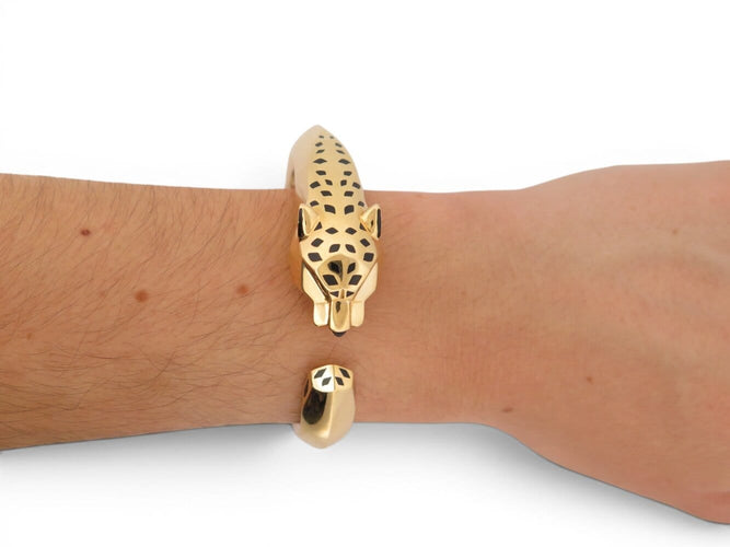 Cartier Panthère - Bracelet en or jaune 18k, tsavorite et onyx 58 Facettes 275131