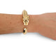 Cartier Panthère - Bracelet en or jaune 18k, tsavorite et onyx 58 Facettes 275131