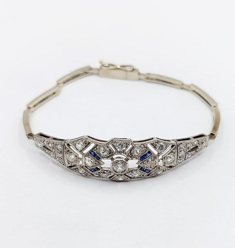 Bracelet Art déco en or blanc, platine, diamants et saphirs 58 Facettes A07544