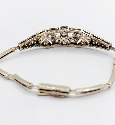 Bracelet Art déco en or blanc, platine, diamants et saphirs 58 Facettes A07544