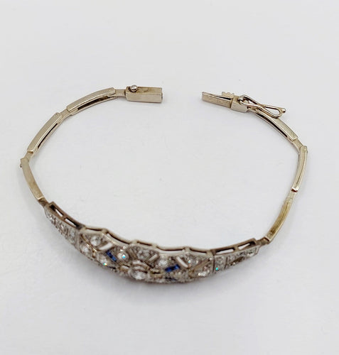 Bracelet Art déco en or blanc, platine, diamants et saphirs 58 Facettes A07544