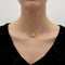 Collier Collier pendentif fleur en or jaune et blanc 18K, diamants 58 Facettes 11156