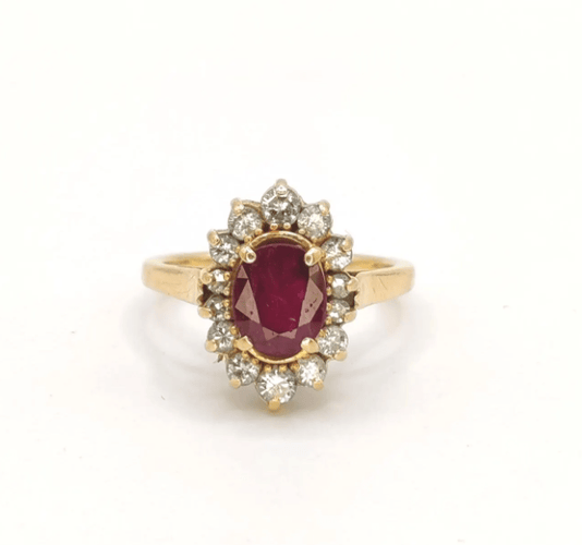 Bague 50 Bague marquise en or jaune, rubis et diamants 58 Facettes 240