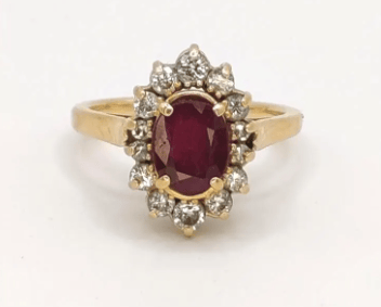 Bague 50 Bague marquise en or jaune, rubis et diamants 58 Facettes 240