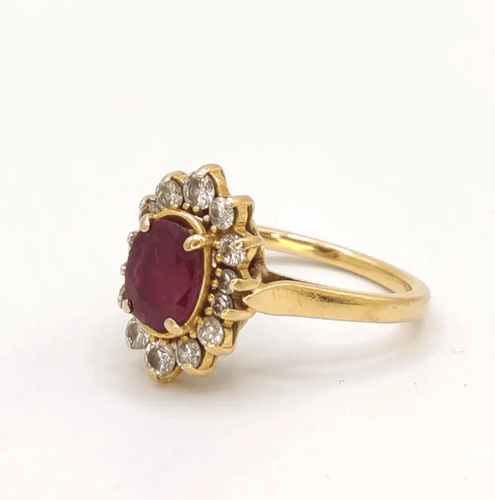 Bague 50 Bague marquise en or jaune, rubis et diamants 58 Facettes 240