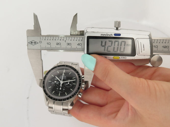 Omega Speedmaster Moonwatch Professional - Montre chronographe en acier 58 Facettes 275922
