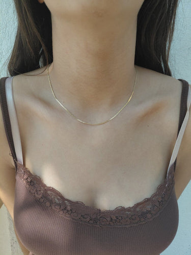 Chaîne maille marine en or jaune 18 carats 58 Facettes 1792561