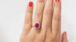 59.5 Bague entourage en or blanc, rubis et diamants 58 Facettes F4833