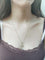 Pendentif M en or jaune, or blanc et diamants 58 Facettes 1793066