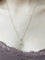Pendentif M en or jaune, or blanc et diamants 58 Facettes 1793066