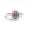 51 Bague en or blanc 18K avec rubis et diamants 58 Facettes E60