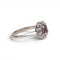 51 Bague en or blanc 18K avec rubis et diamants 58 Facettes E60