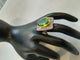 54 Bague cocktail en or jaune et blanc, péridot et diamants 58 Facettes 01374