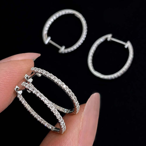 Boucles d'oreilles Embrace - Boucles d'oreilles créoles ovales en or blanc 18K et diamants 58 Facettes GER1004WG