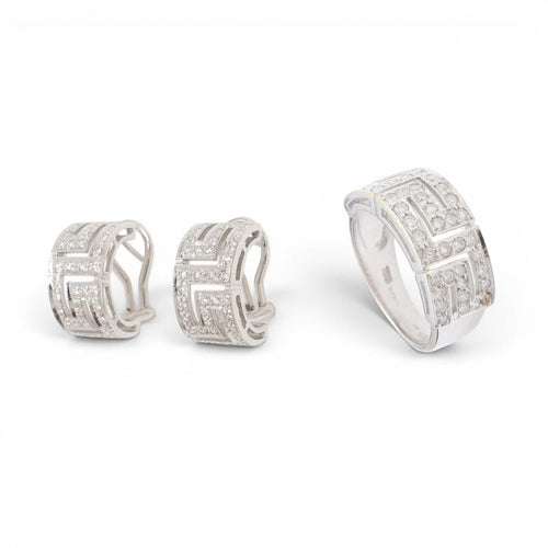 57 Parure géométrique - Bague et boucles d'oreilles en or blanc et diamants 58 Facettes E62
