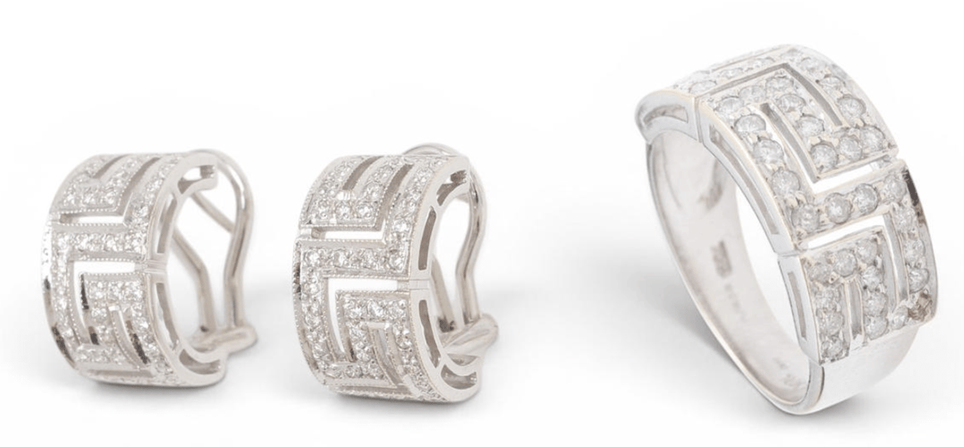 57 Parure géométrique - Bague et boucles d'oreilles en or blanc et diamants 58 Facettes E62