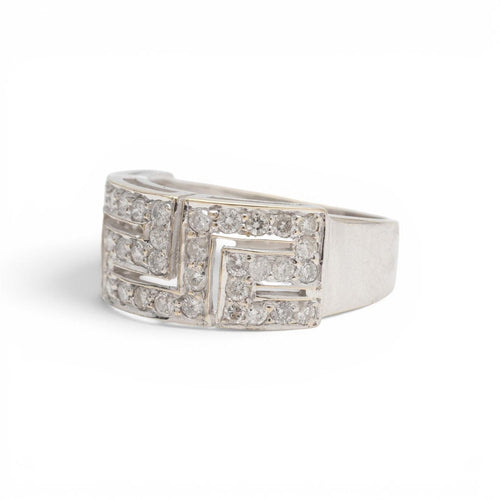 57 Parure géométrique - Bague et boucles d'oreilles en or blanc et diamants 58 Facettes E62