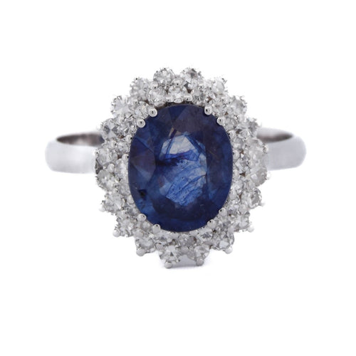 56 Bague en or blanc 18 kt avec saphir et diamants 58 Facettes AN537 (00119)
