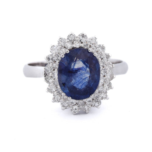 56 Bague en or blanc 18 kt avec saphir et diamants 58 Facettes AN537 (00119)