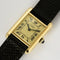 Montre Cartier Tank Must - Montre en argent plaqué or, cadran crème 58 Facettes A1207