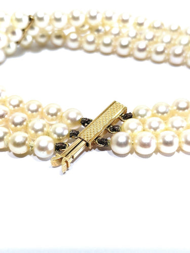 Bracelet en or jaune 18 carats et perles de culture 58 Facettes 1794592