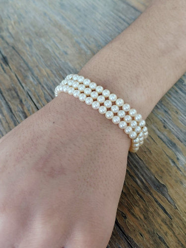Bracelet en or jaune 18 carats et perles de culture 58 Facettes 1794592