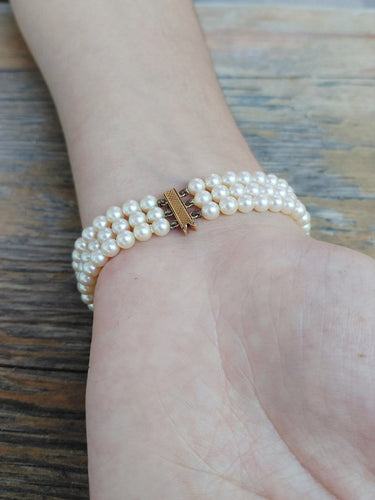 Bracelet en or jaune 18 carats et perles de culture 58 Facettes 1794592