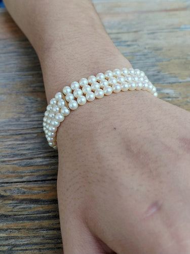 Bracelet en or jaune 18 carats et perles de culture 58 Facettes 1794592